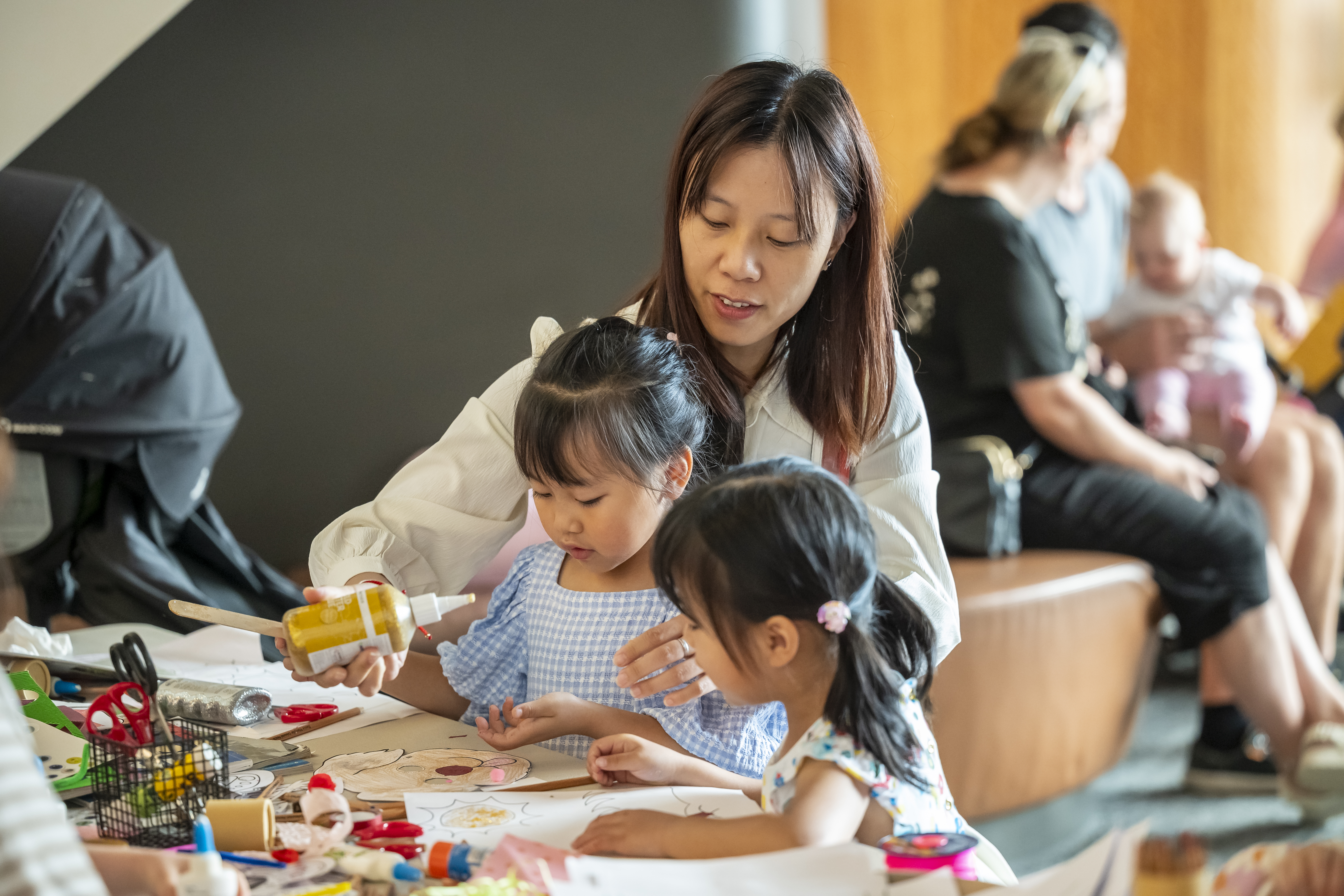 A family doing craft together
