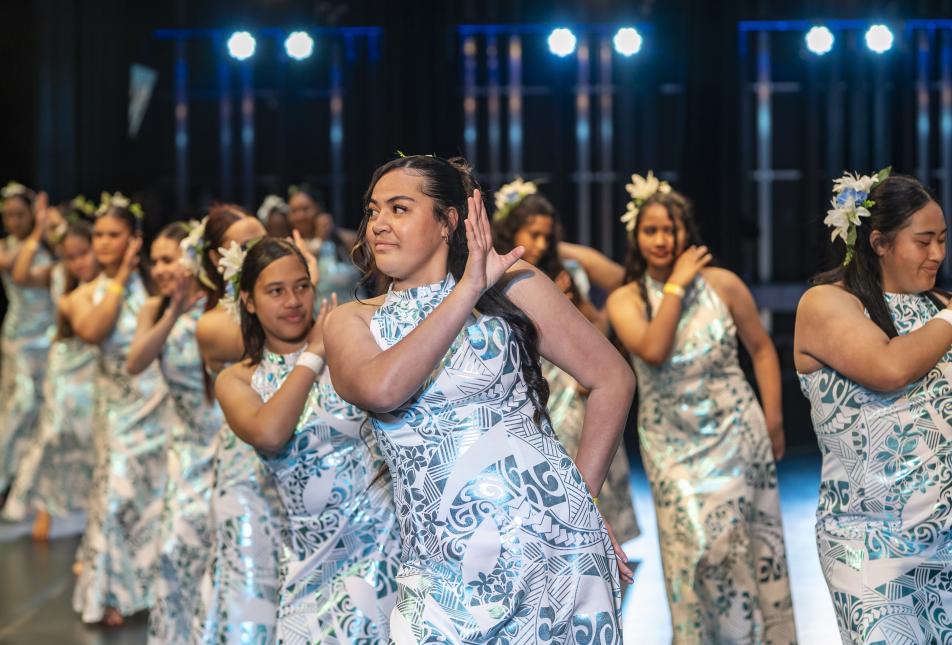 Young dancers on stage during the Cultivating Creative Cultures with Communities 2025 performances.