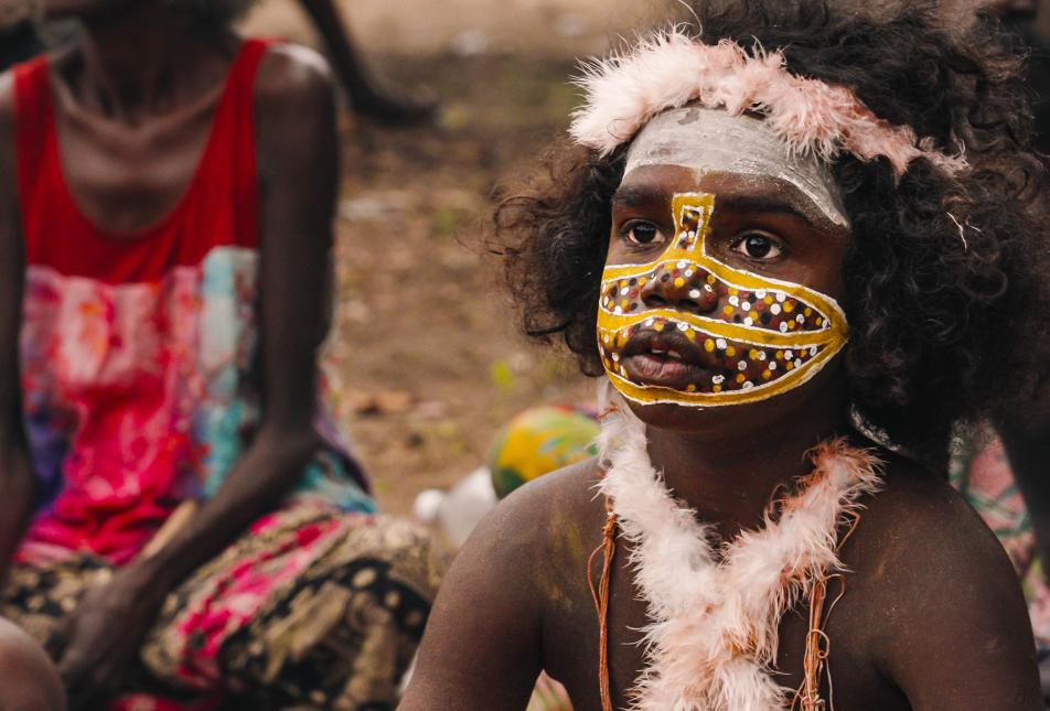 A young Indigenous boy wearing traditional body paint - a scene from Journey Home, David Gulpilil