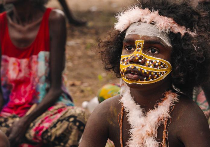 A young Indigenous boy wearing traditional body paint - a scene from Journey Home, David Gulpilil