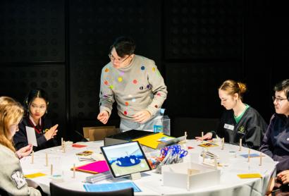 students participating in a workshop with architect and designer kelwin Wong